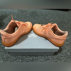 Women’s Air Force 1 07 premium. Color: sunset glow